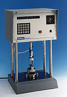 A manual compression tester made by Wallace in UK